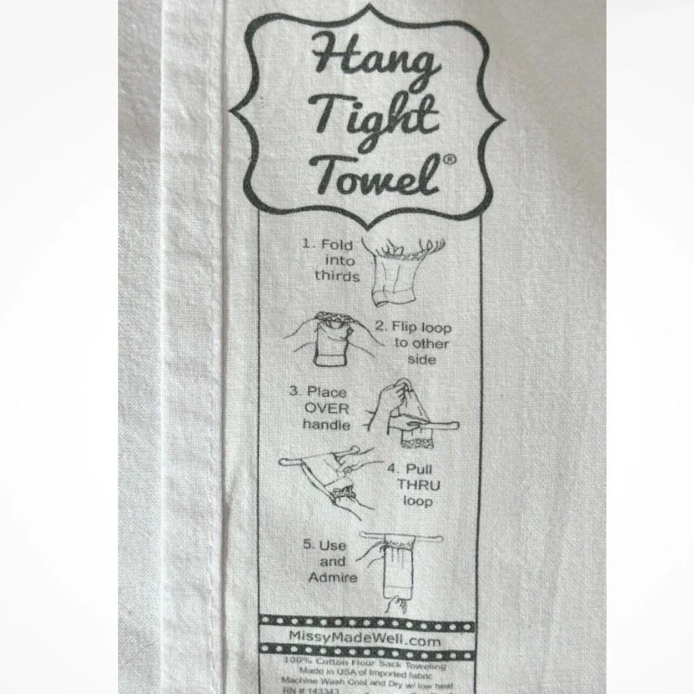 White Graphic “Hang Tight Towel” with Black Text